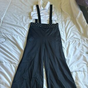 Weissman Medium Child Black Pants with suspenders and white top. Rhinestones